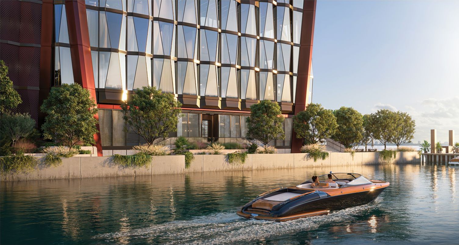 A boat leaving the private dock at the south entrance of Villa Miami, developer rendering